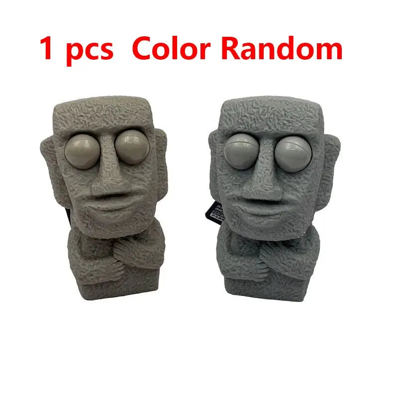 Stone man releases stress toy slowly rebounds soft Moai statue squeeze eyes interested expression relaxes stress children's gift